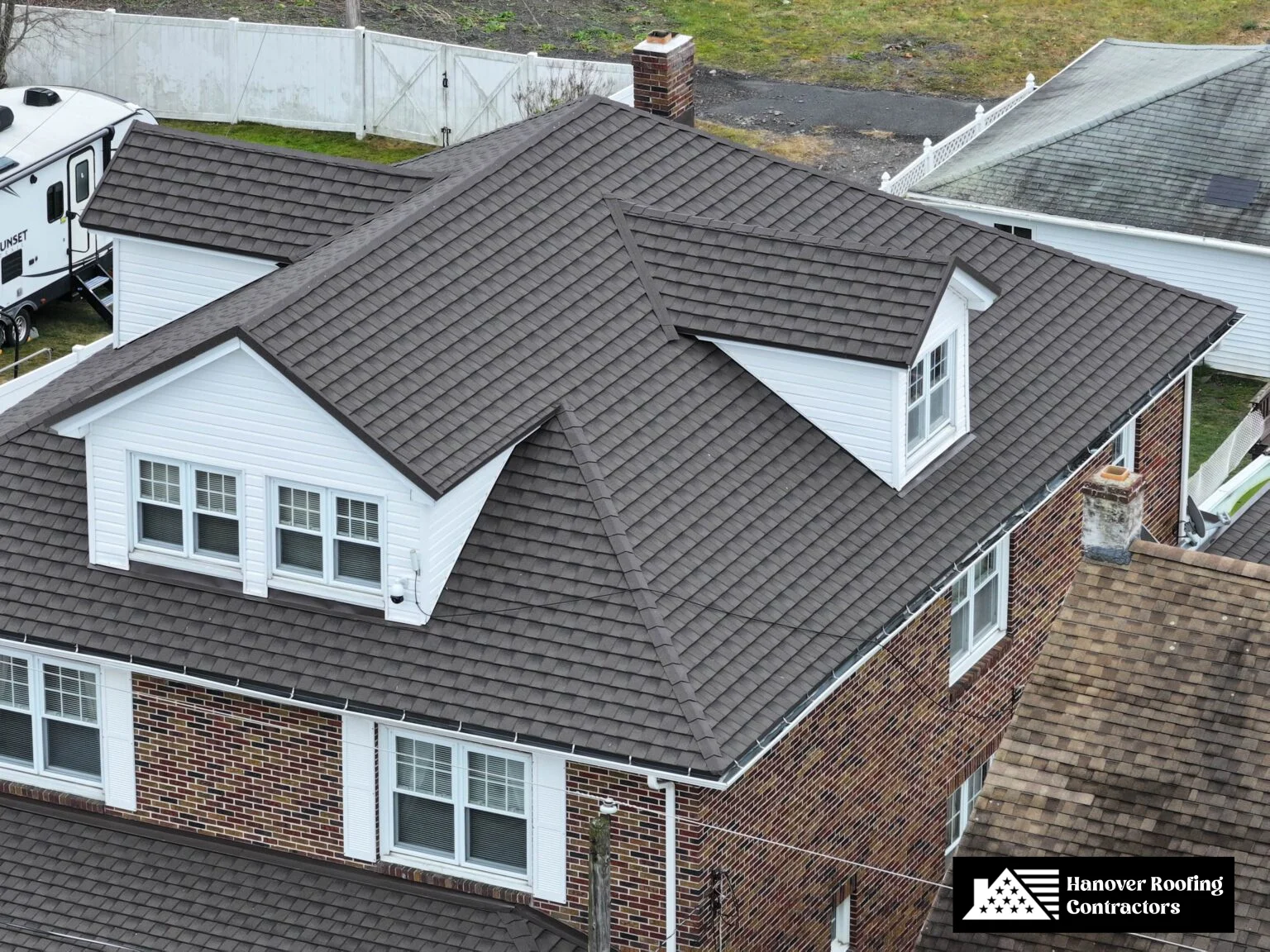 Brick home with a durable, weather-resistant asphalt shingle roof.